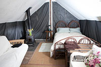 Farm stay deluxe furnished wall tent interior