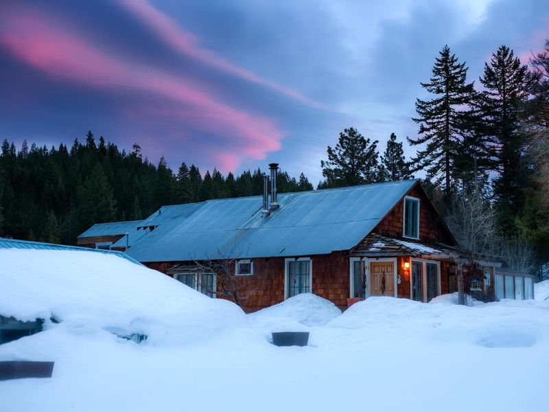Sunrise over Farmhouse in Winter