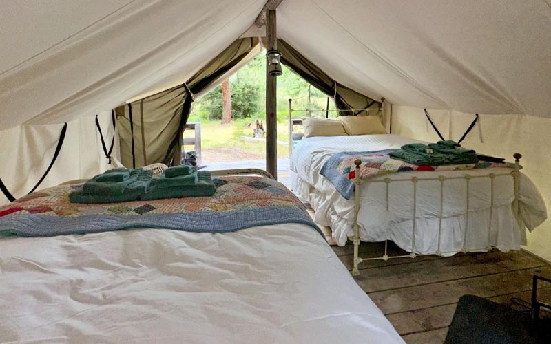 Looking from inside wall tent to outdoors